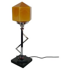 An Art Deco Amber Glass and Bakelite Table Lamp