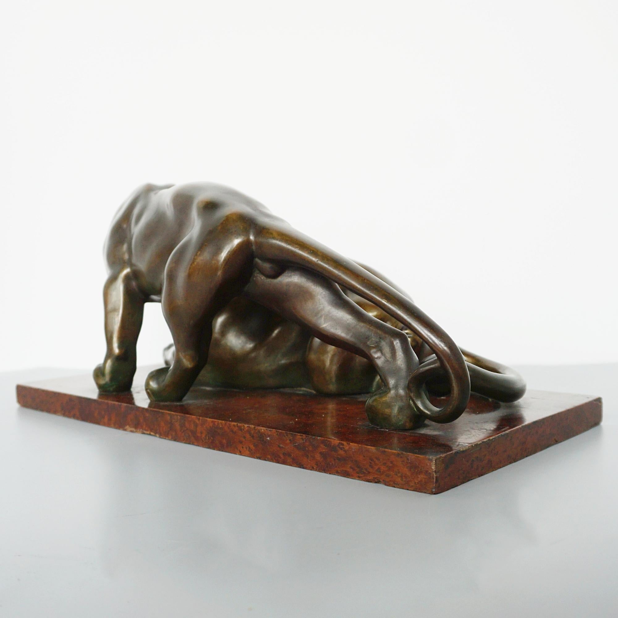 An Art Deco Bronze Sculpture Group Depicting Two Prowling Panthers 1