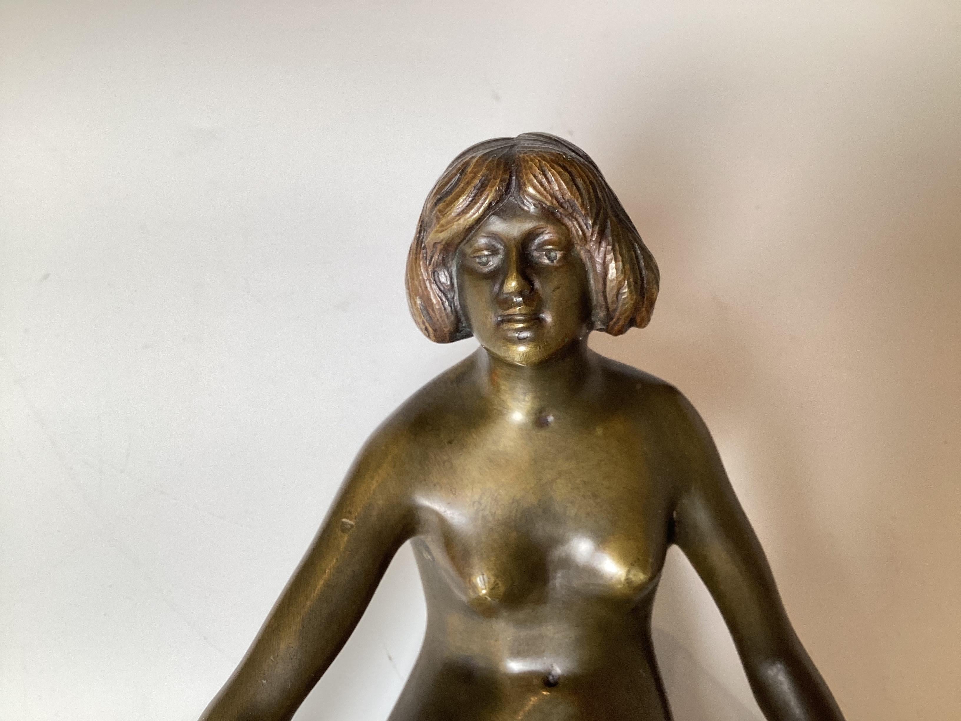 An Art Deco Bronze Sculpture of a Young Woman For Sale 5