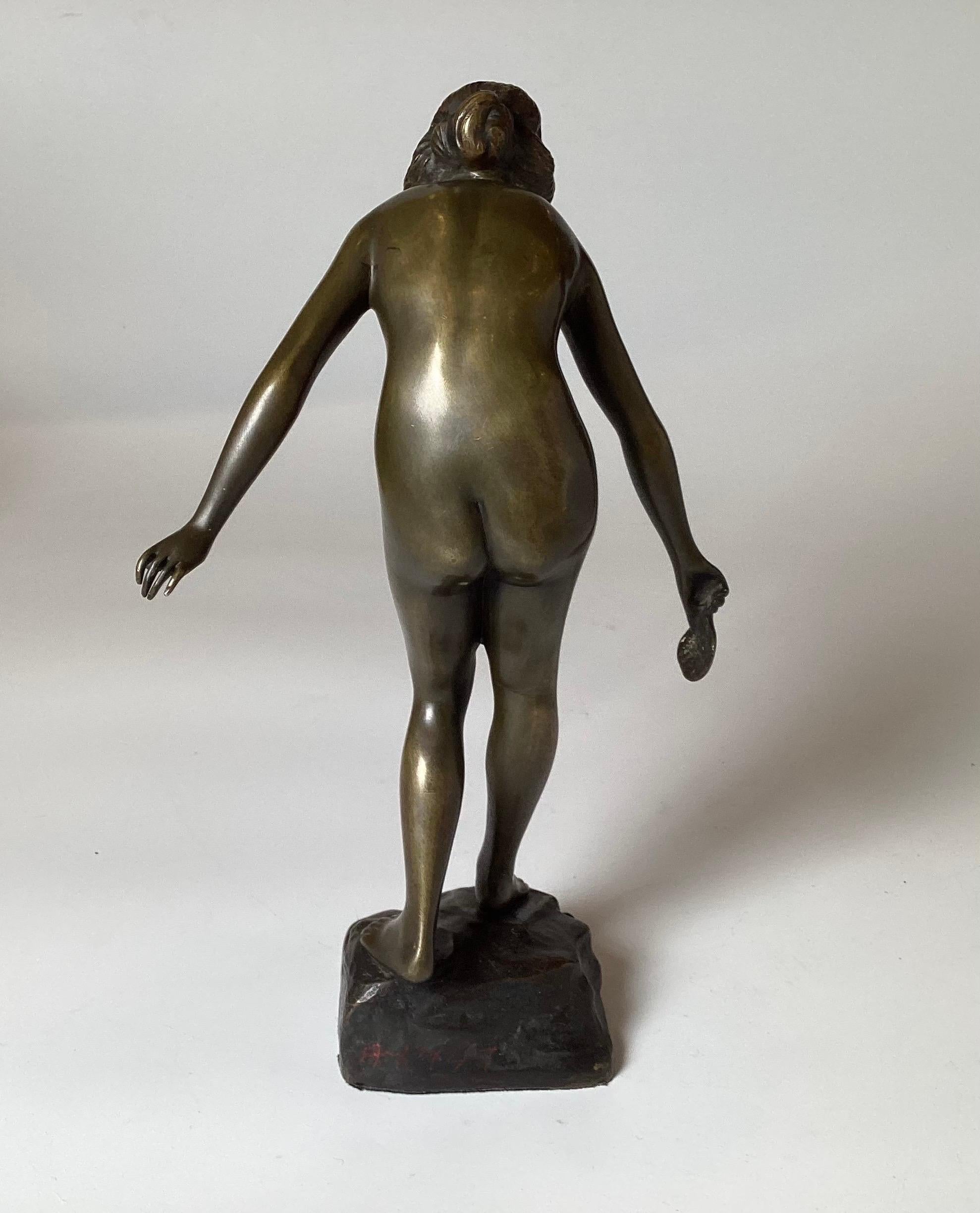 Early 20th Century An Art Deco Bronze Sculpture of a Young Woman For Sale