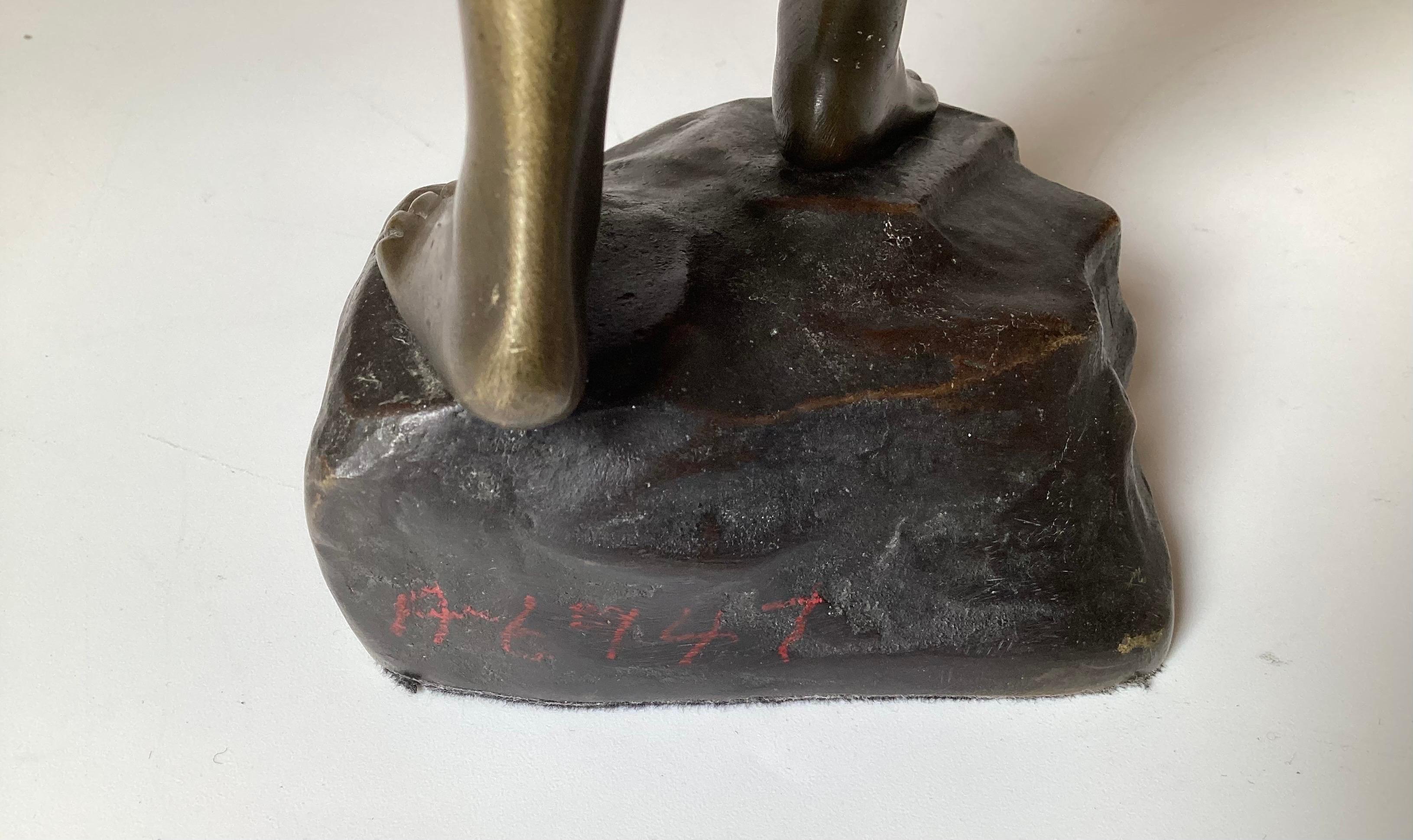 An Art Deco Bronze Sculpture of a Young Woman For Sale 4