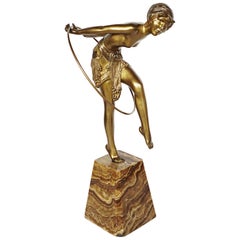 An Art Deco Bronze Study of a Hoop Dancer by Demétre Chiparus