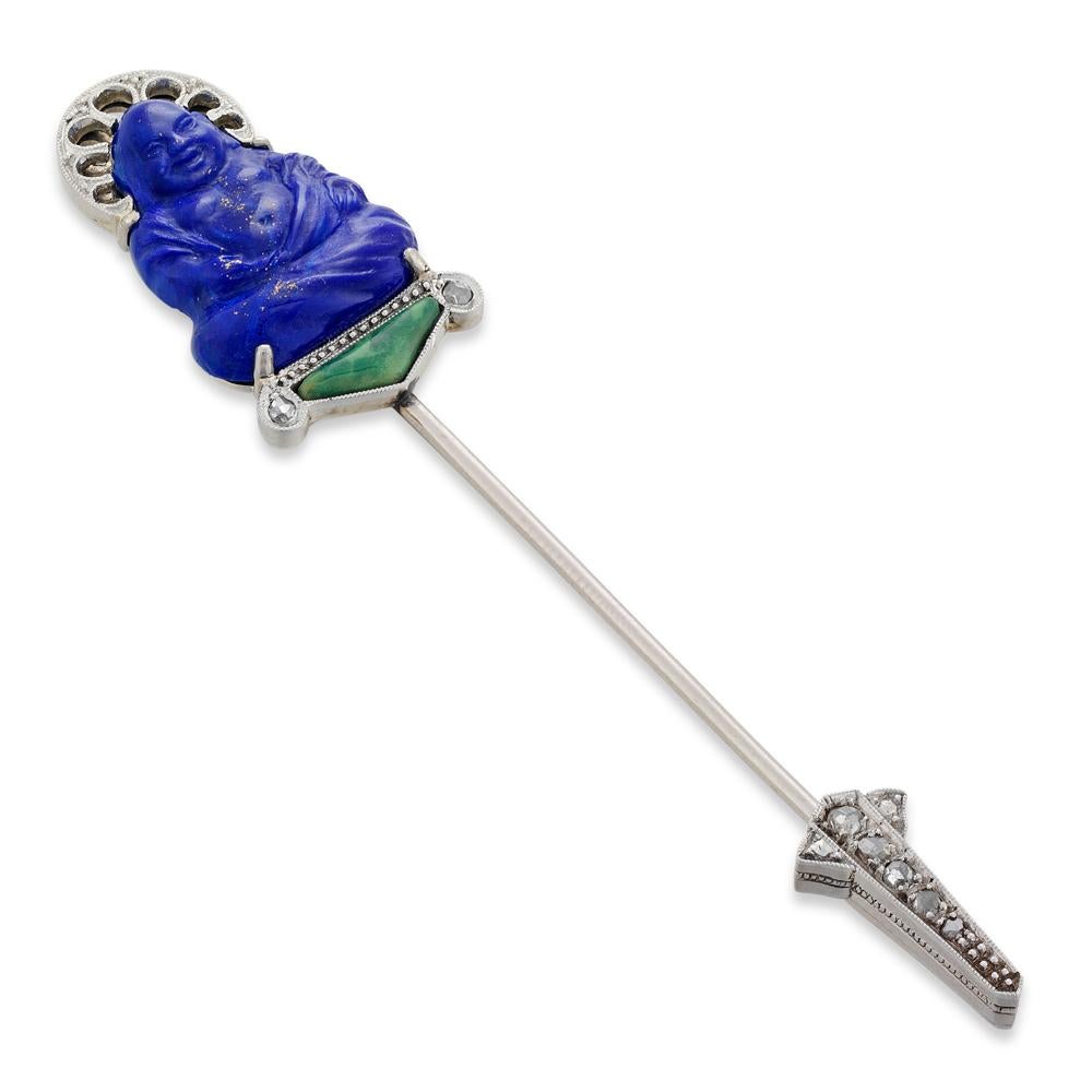 Épingle à sureté bouddha Art déco, sertie d'un bouddha en fine pâte de verre bleue, reposant sur un piédestal en diamant et en pâte de verre verte, avec une couronne en platine, le tout sur une monture en platine et une épingle à bâton, avec une