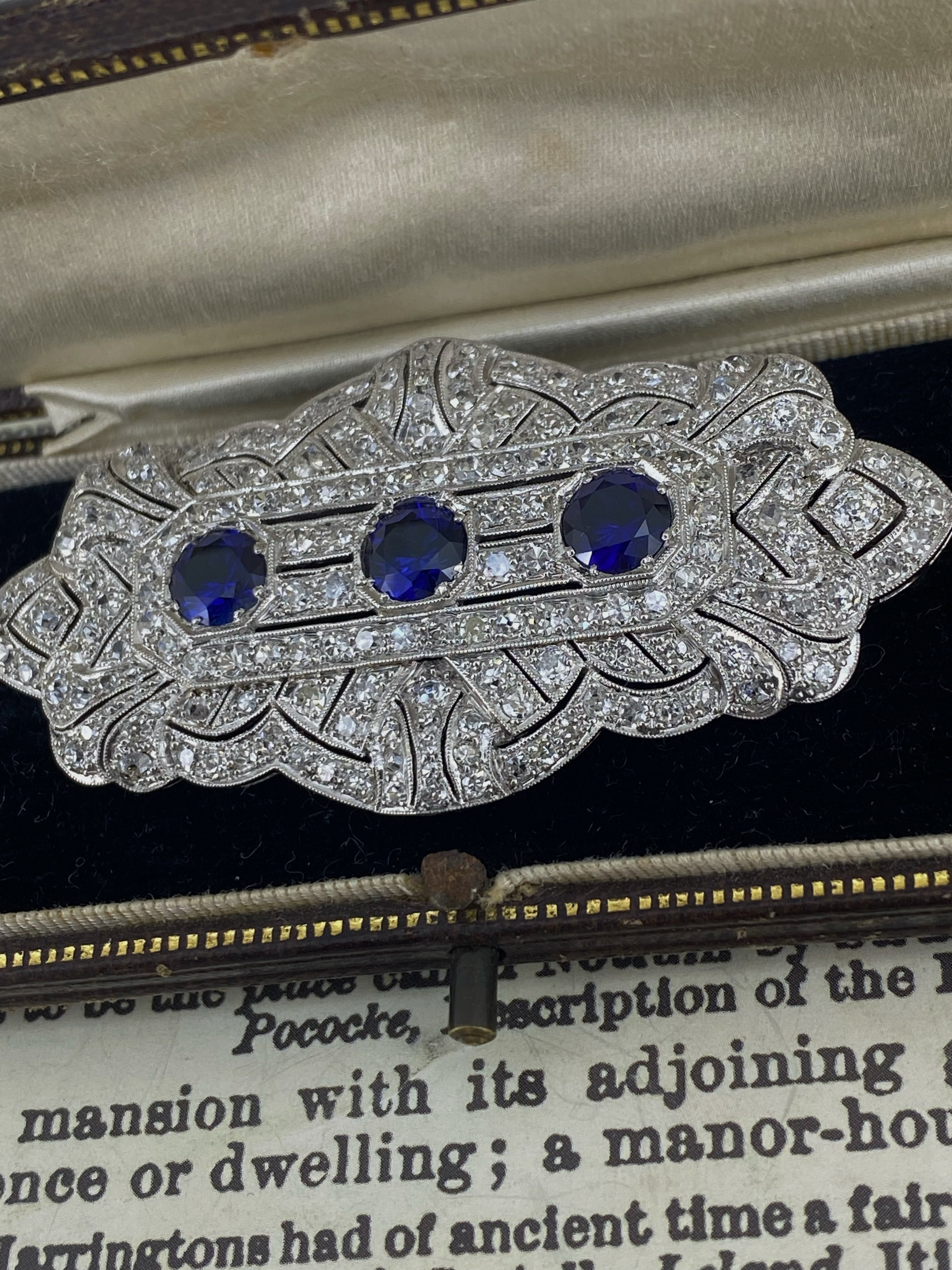 This magnificent handmade piece of jewelry is 
from Art-Deco period, 
yet is in immaculate condition 
 
Crafted in Platinum,
with exceptional attention to details,
the brooch is highly detailed & elaborate
 
To a concave filigree style, 
the brooch