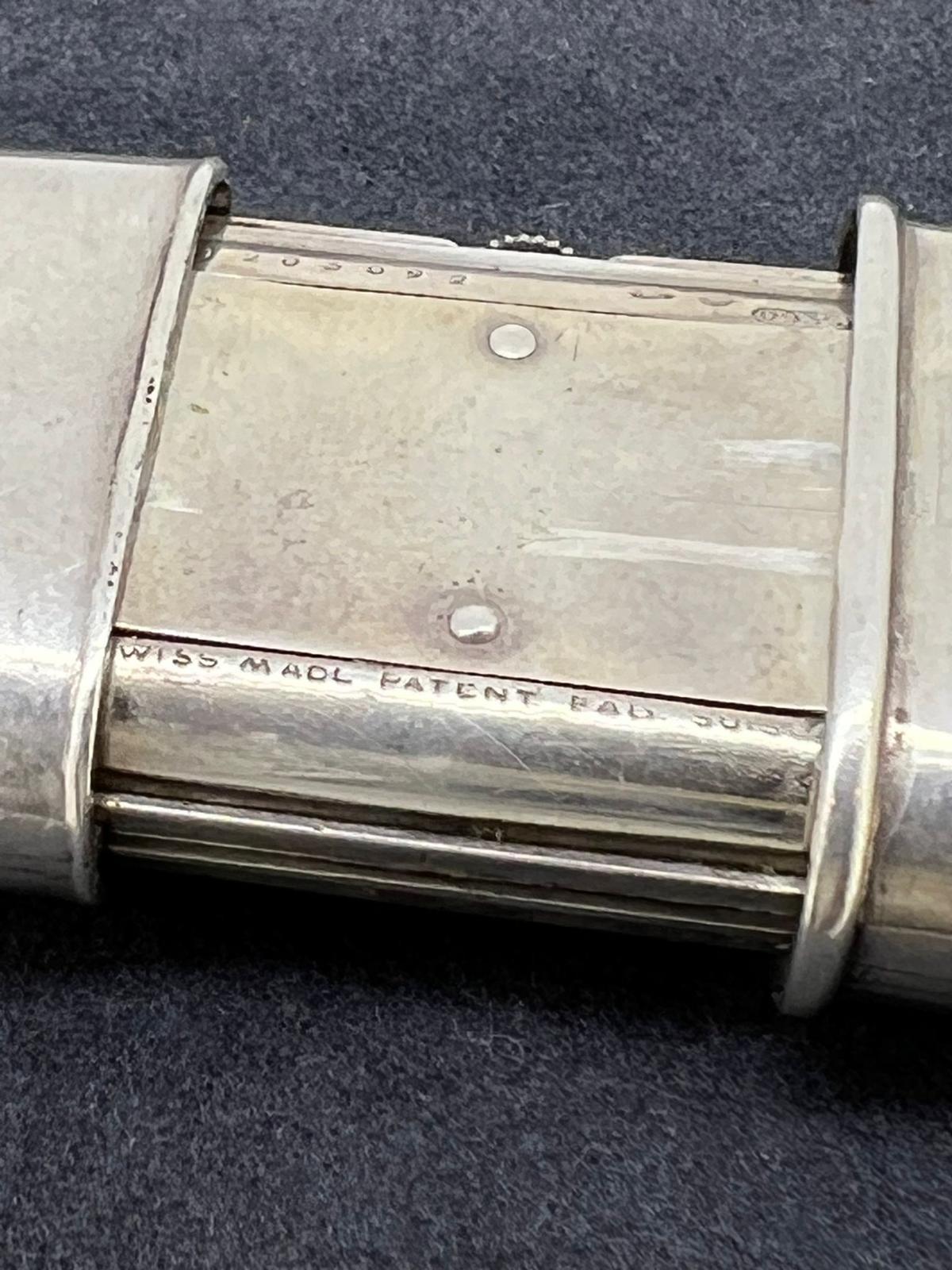 This Travel Clock by Movado is Swiss made, 
it’s dating from 1925,  
yet it’s in great condition & in excellent working order.

Performed in 935 Solid Silver, 
the clock measures 35mm (H) x 60mm (when opened)
47mm (when closed)

Case is signed,