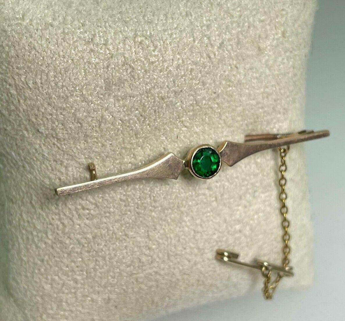 Round Cut An Art-Deco c1930's Gilson Synthetic Emerald 9K Yellow Gold Bar Brooch For Sale