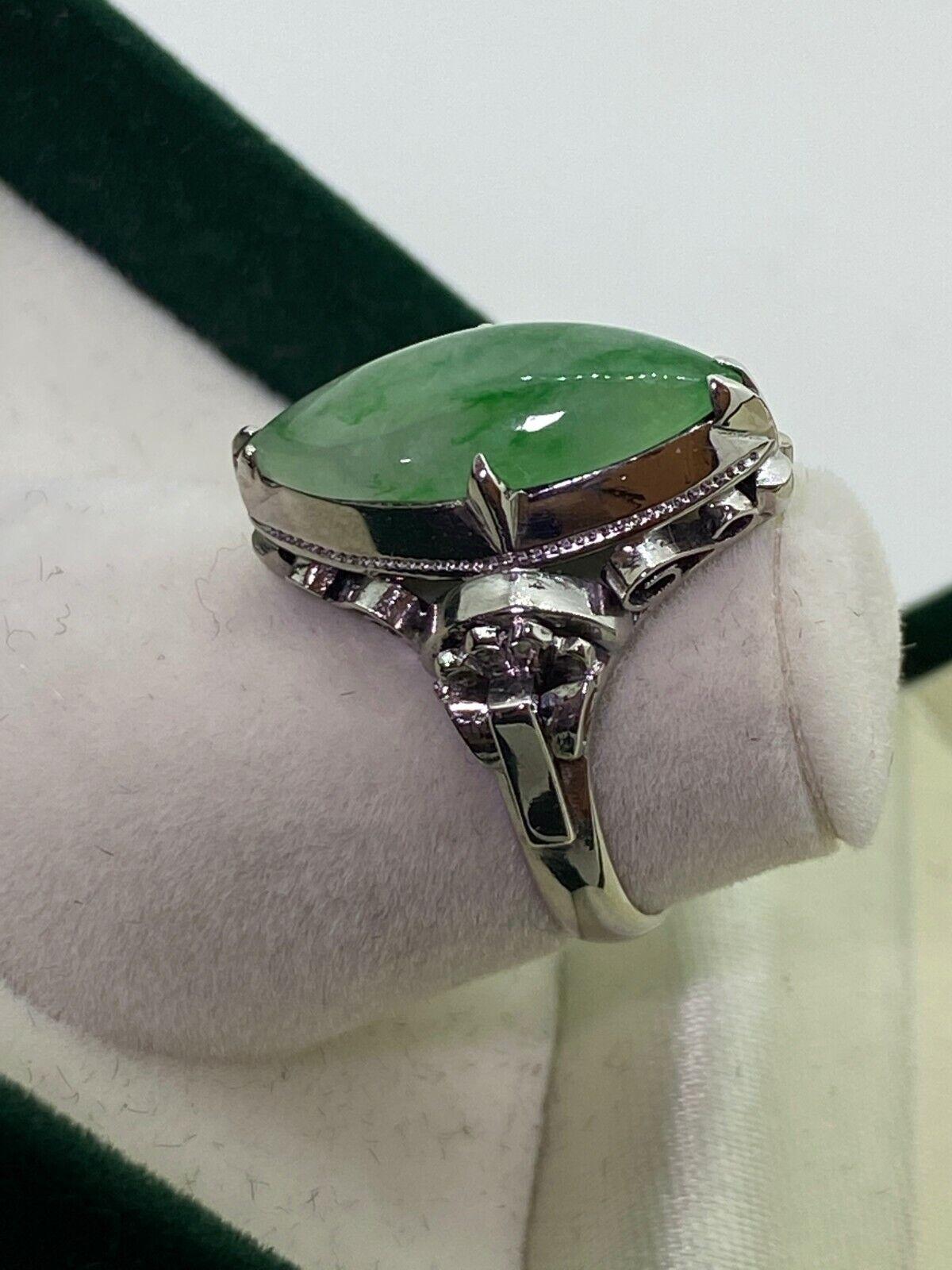 Art Deco An Art-Deco c1930's Natural Marquise Shaped Jadeite Ring in 18K White Gold. For Sale