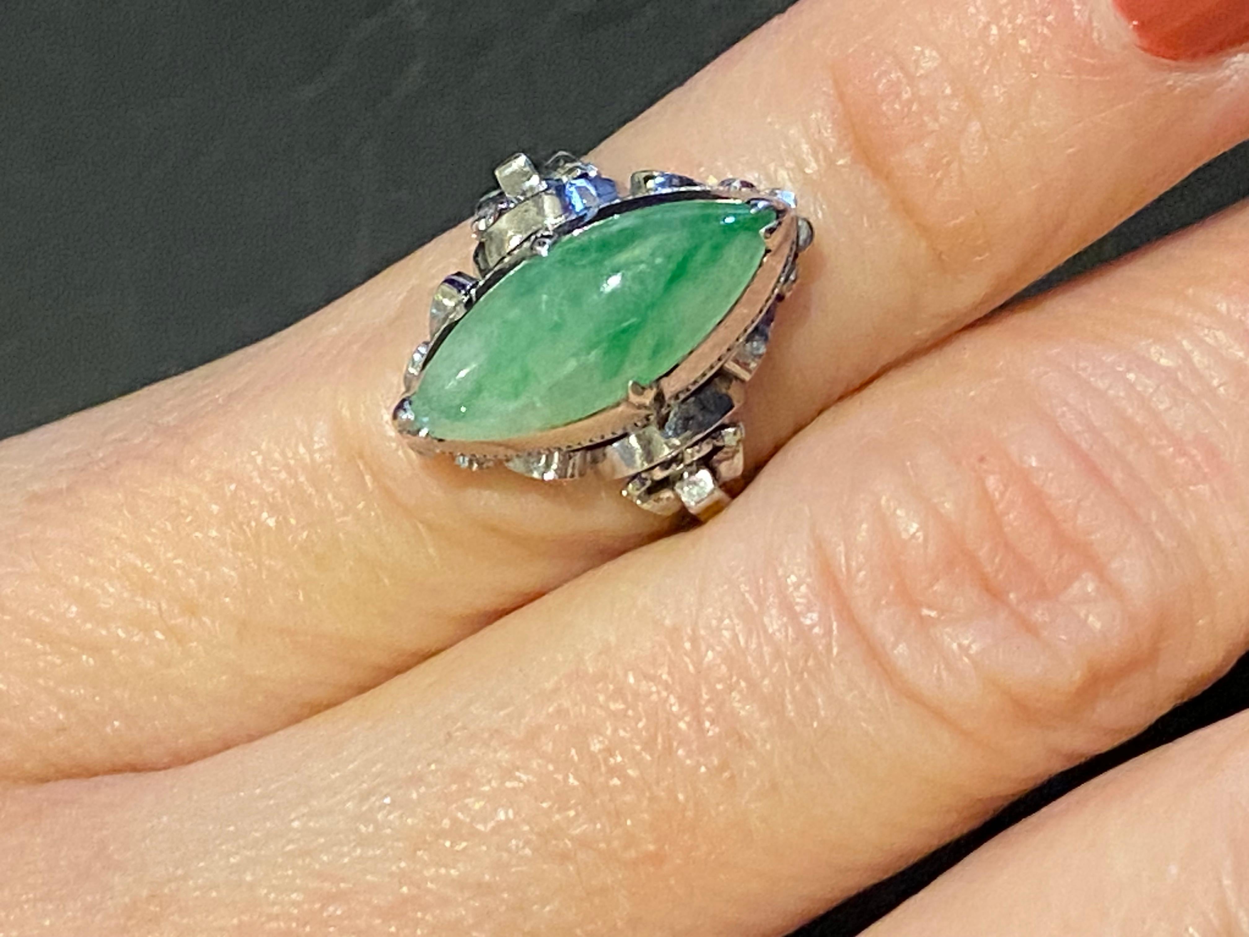 Women's or Men's An Art-Deco c1930's Natural Marquise Shaped Jadeite Ring in 18K White Gold. For Sale