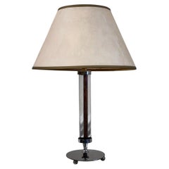 An art deco chrome and glass table lamp