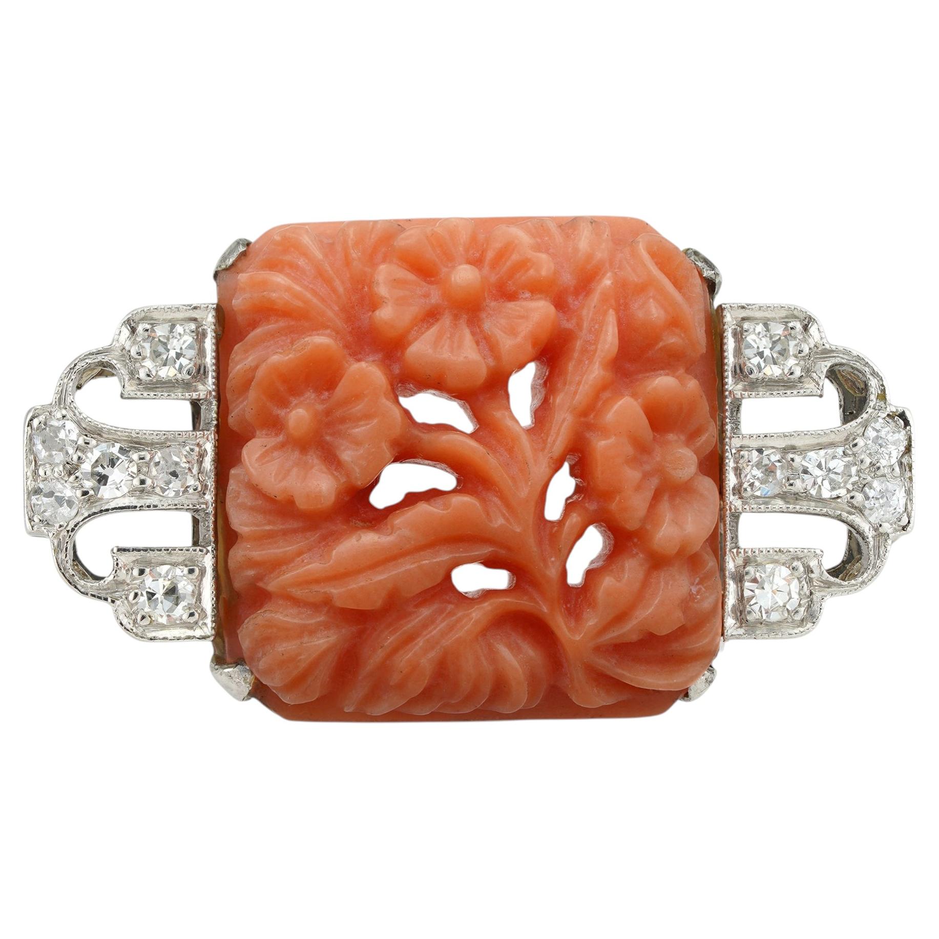 An Art Deco coral and diamond brooch