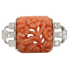 An Art Deco coral and diamond brooch