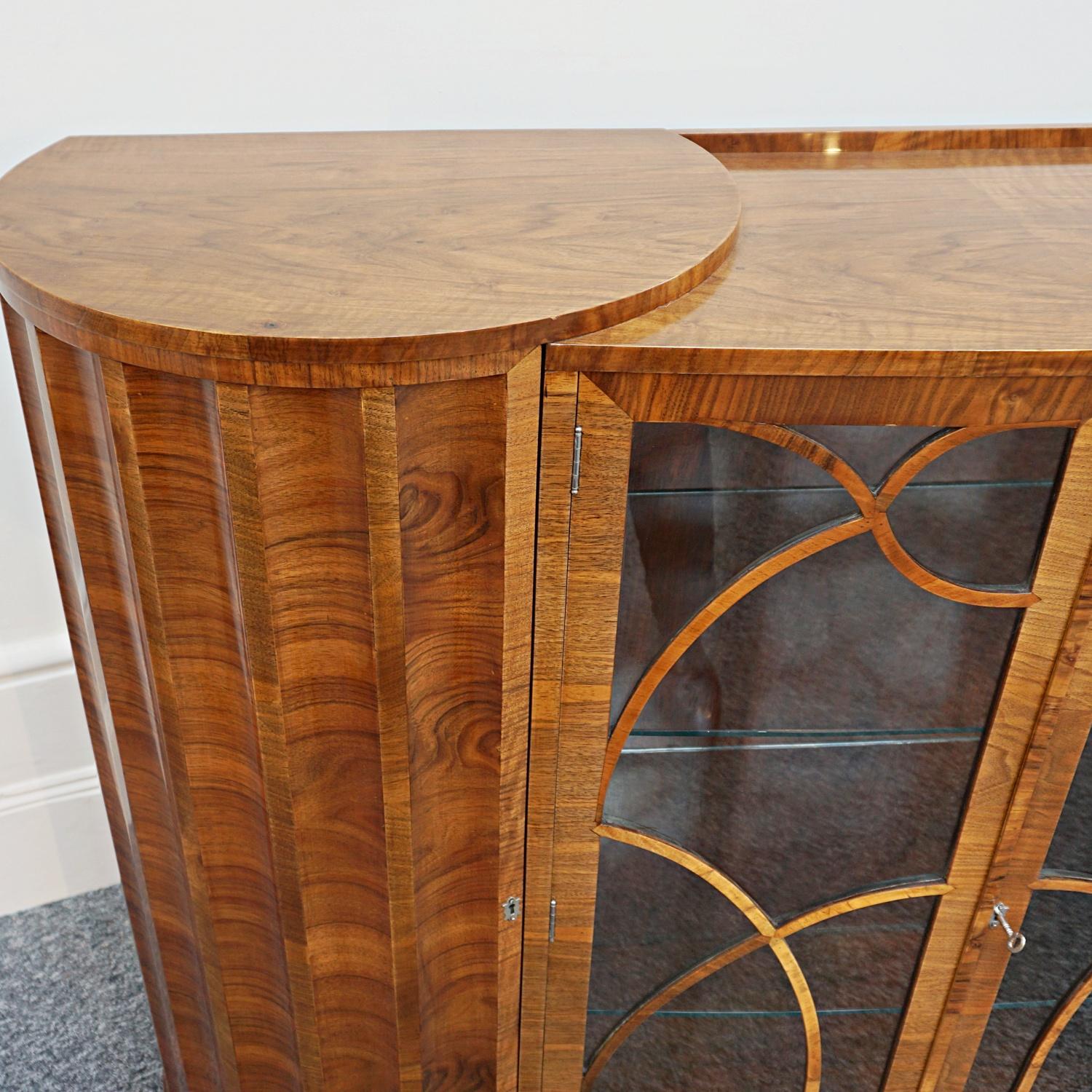 English Art Deco Curved and Fluted Walnut Cabinet, circa 1930