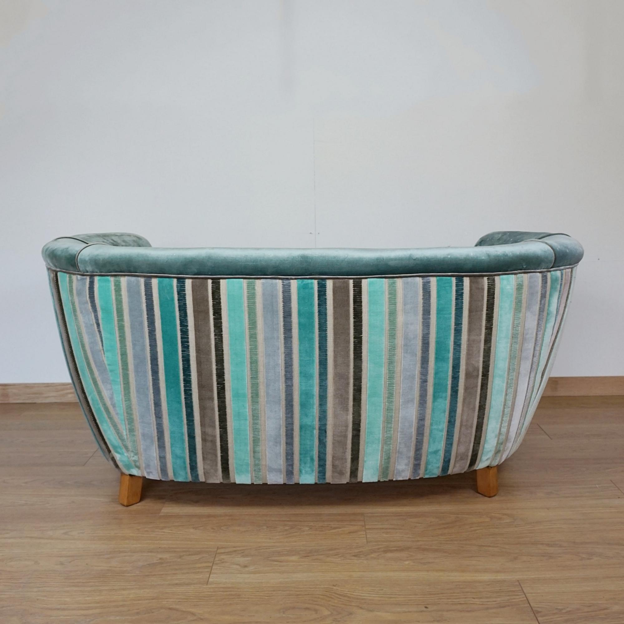 An Art Deco Curved Sofa Upholstered in Velvet 4