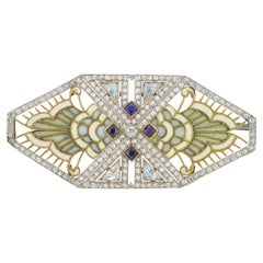 An Art Deco diamond, gem-set and enamel brooch