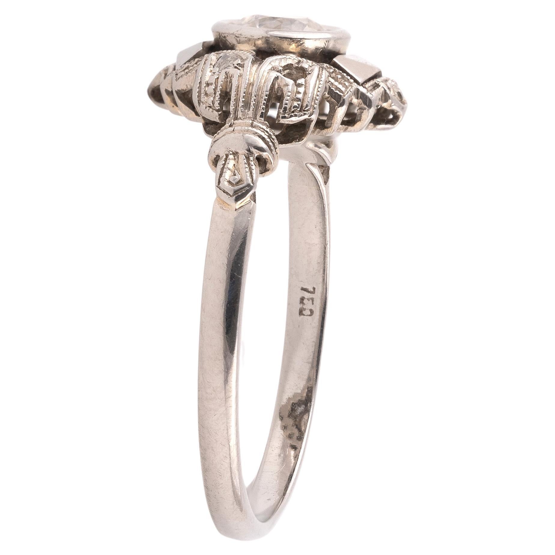 Centered with a old cut diamond weighing approx. 1 ct to an openwork bezel and shoulders, mounted in 18kt white gold
circa 1935
Size 7
Weight 2.1gr.