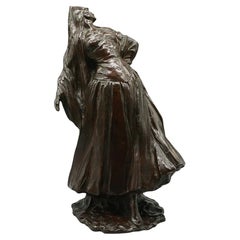 An Art Deco Figurative Sculpture of A Classically Dressed Belgian Woman