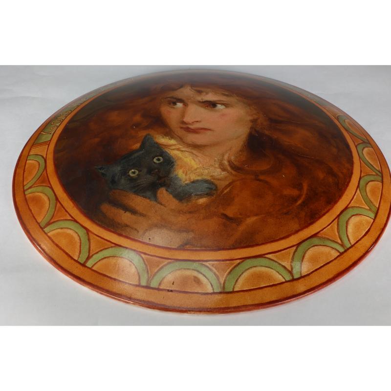 Early 20th Century An Art Deco hand painted plate depicting Lois the Witch holding a black cat.