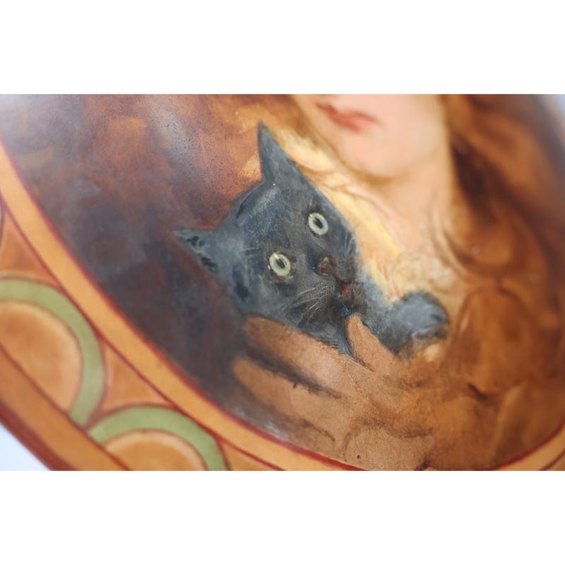Ceramic An Art Deco hand painted plate depicting Lois the Witch holding a black cat.