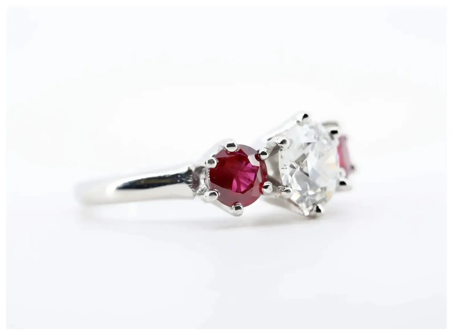 Edwardian An Art Deco inspired diamond, and ruby dome style ring in platinum.  Centered by For Sale