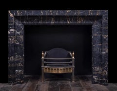 An Art Deco inspired mantel in semi-precious Nero Portoro by Ryan and Smith