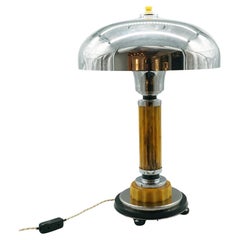 An Art Deco Marbled Orange Bakelite Dome Lamp