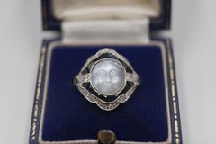 Art Deco Moonstone, Diamond, Platinum and Blue Sapphire Moonface Ring