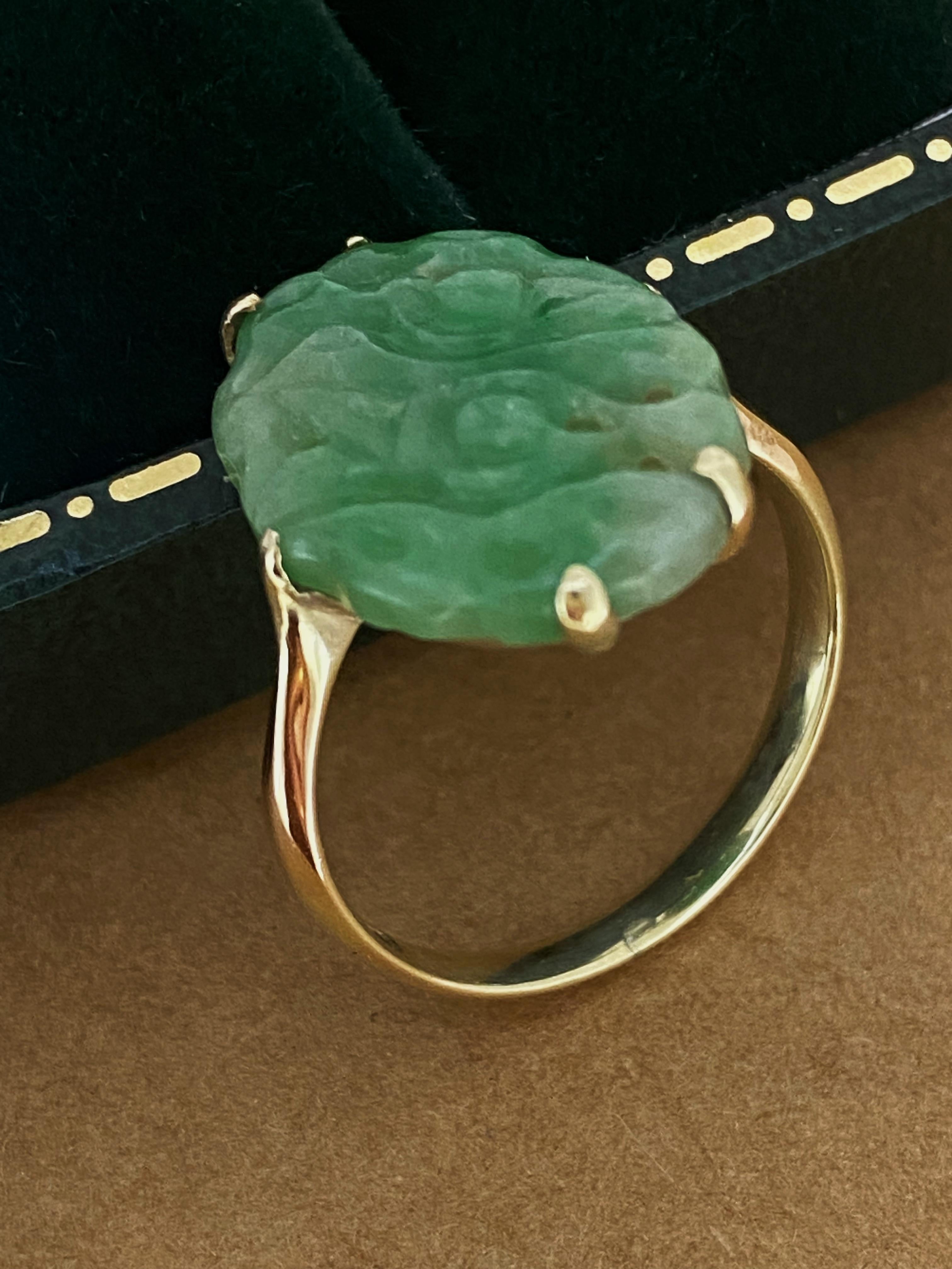 Art Deco An Art-Deco Natural Green Carved & Pierced Jade (19mm) Ring in 14K Yellow Gold. For Sale