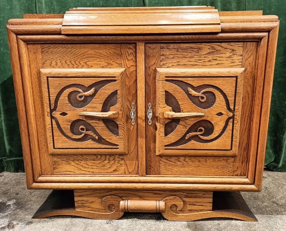 An art deco oak sideboard in the style Charles Dudouyt. circa 1940/1950.