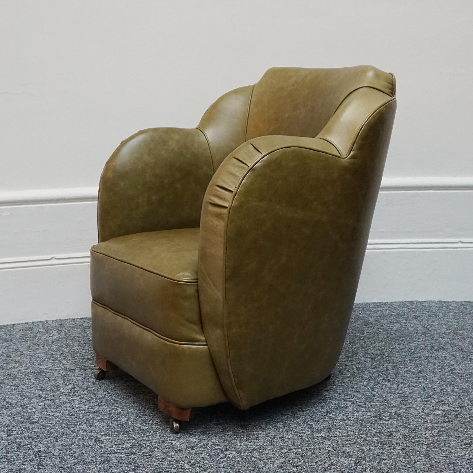 An Art Deco Cloud chair. Original walnut castors, re-upholstered in olive green leather with ruched arm rests.

Dimensions: H 82cm W 68cm D 50cm 

Origin: English

Date: 1935

Item Number: 2102243

