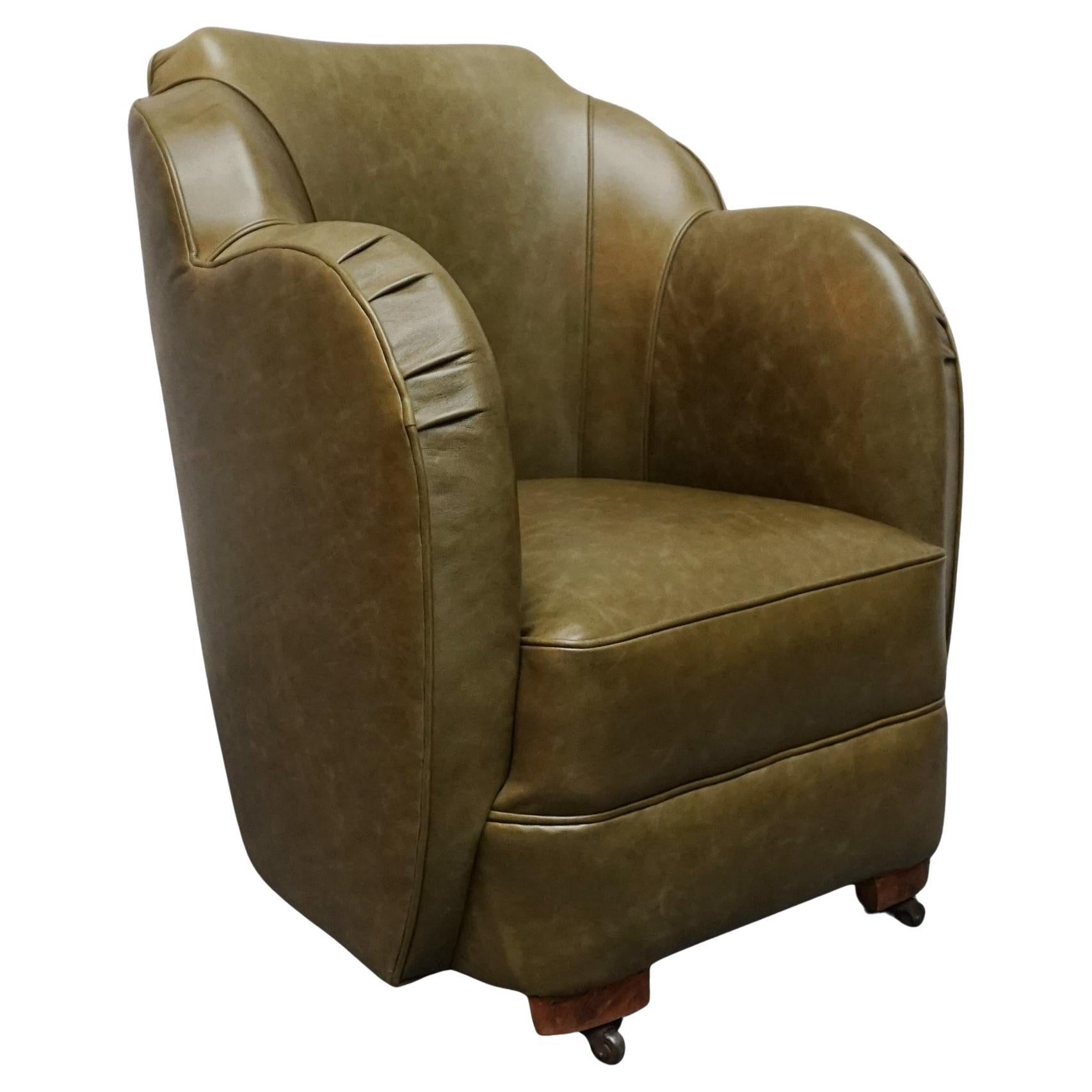An Art Deco Olive Green Leather Cloud Chair For Sale