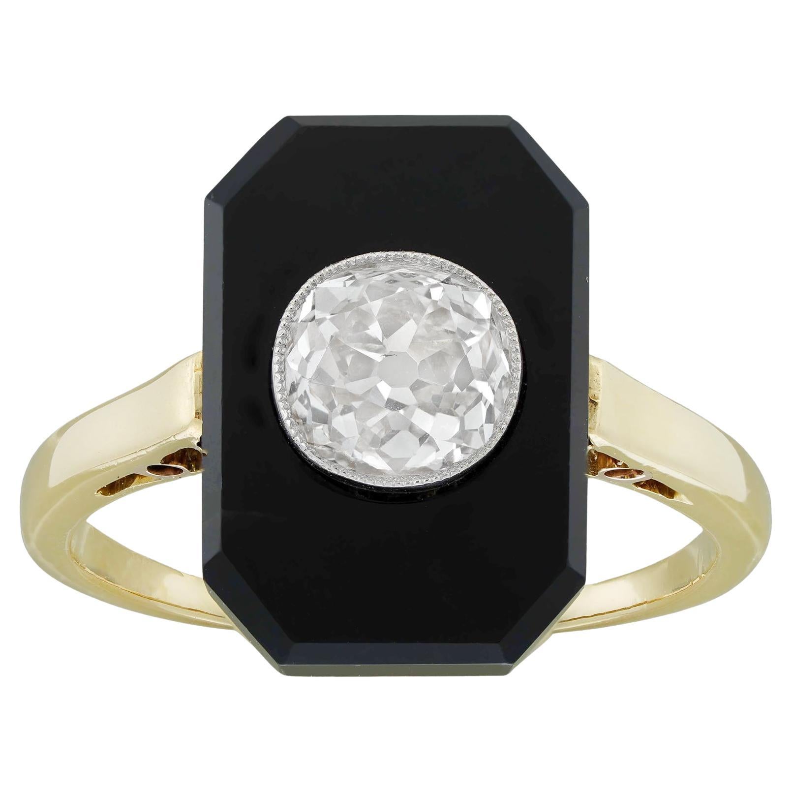 An Art Deco Onyx And Diamond Ring