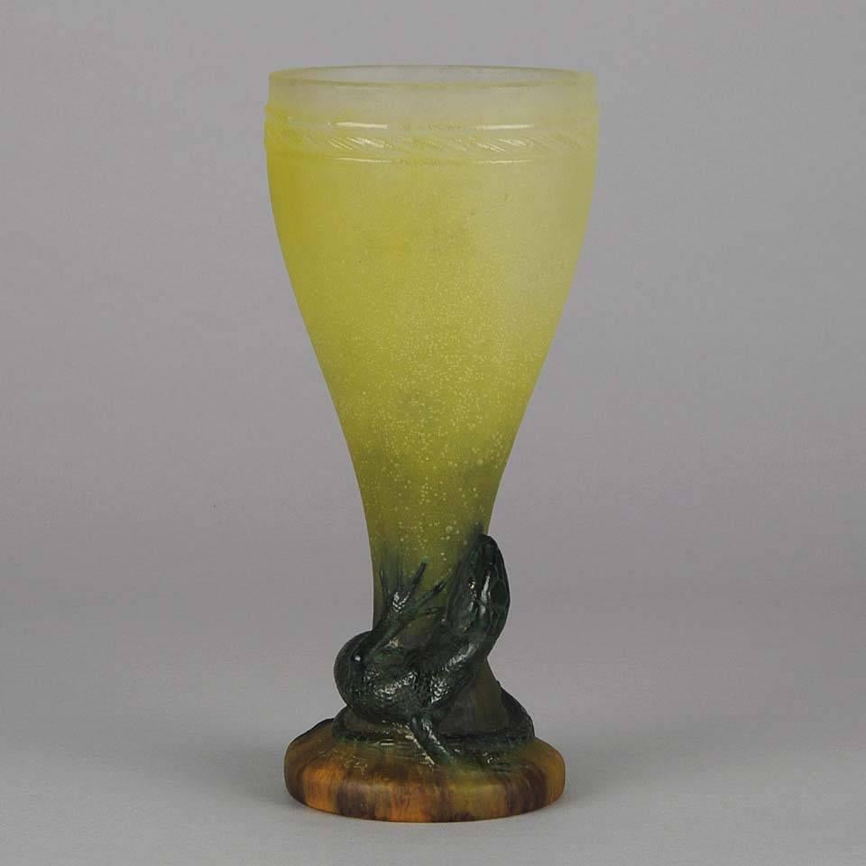 A fantastic and very rare early 20th century pate-de-verre glass vase decorated with a lizard coiled around the bottom with a very fine orange and green color that fades out into yellow. Exhibiting excellent color and very fine detail, signed A.