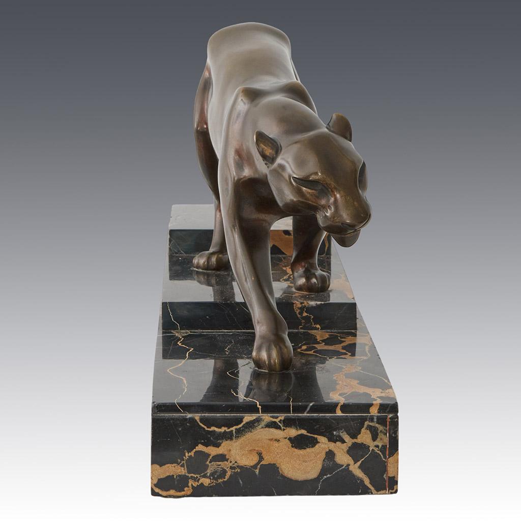 An Art Deco patinated bronze study of a prowling panther by Henri Molins In Good Condition For Sale In Forest Row, East Sussex