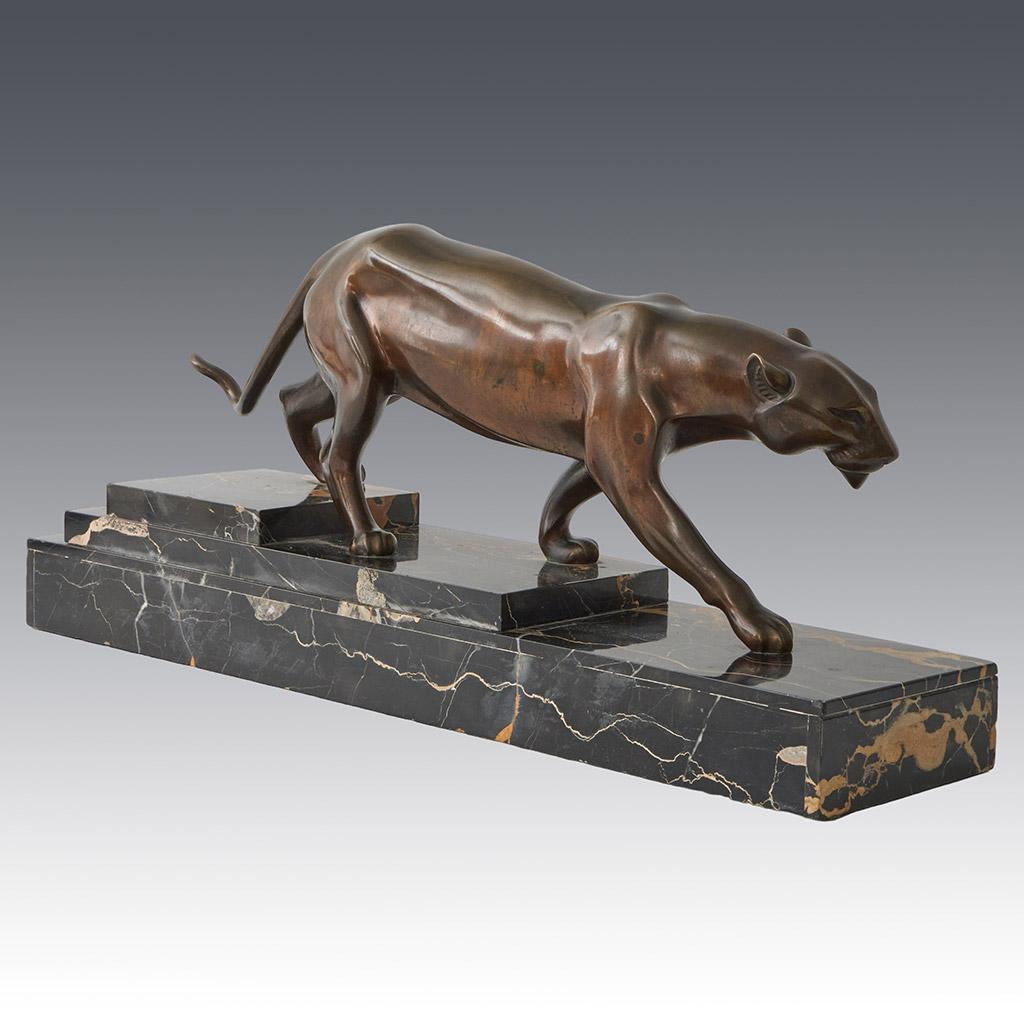 An Art Deco patinated bronze study of a prowling panther by Henri Molins In Good Condition For Sale In Forest Row, East Sussex
