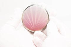 An Art Deco Pink Guilloche Enamel and Silver Compact