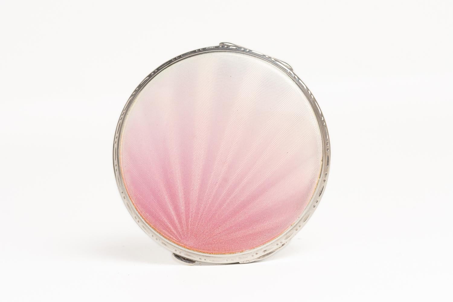 An Art Deco Pink Guilloche Enamel and Silver Compact 1