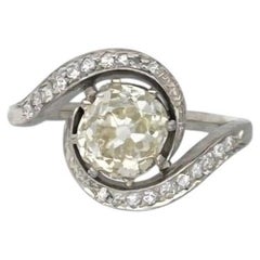 An Art Deco platinum and Old European Cut diamond Toi et Moi ring