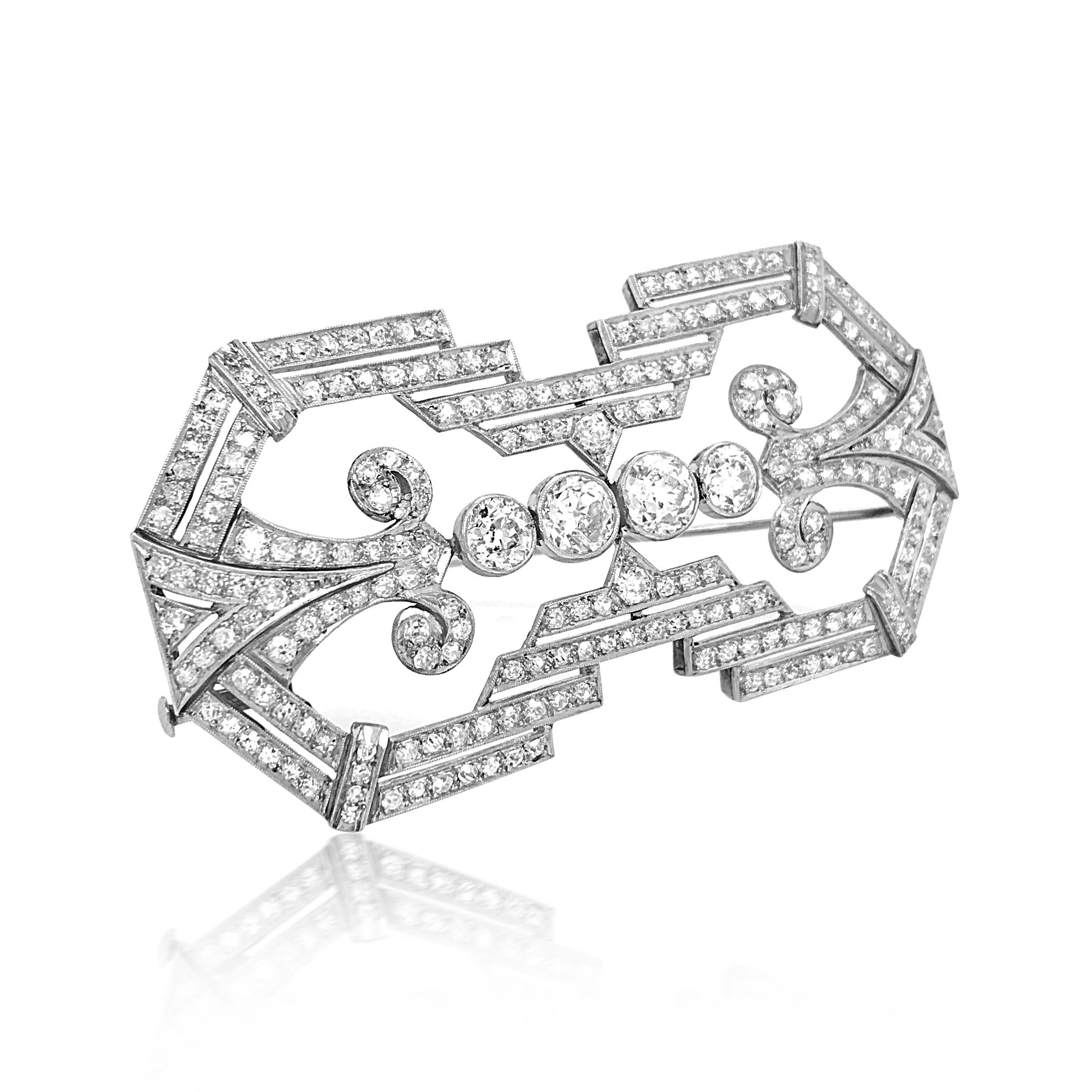 This authentic and immaculately Art Deco Brooch is crafted in platinum. Exuding elegance and astonishing glitter, this invaluable piece contains 4 old European cut diamonds weighing approximately 2.75 carats total and approximately 226 old mine and