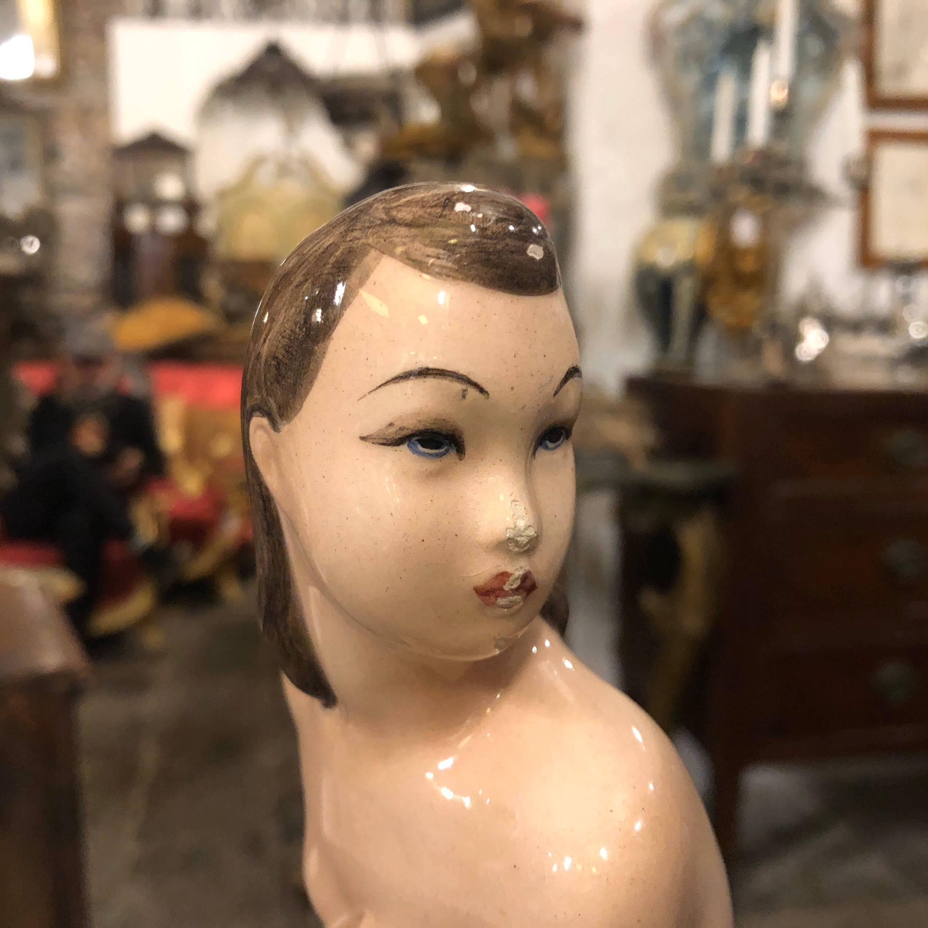 A stylish porcelain statue made in Italy in the 1940s by Cia Manna small laboratory in Turin. It's in good conditions with normal signs of age. A super piece of Italian Art Deco.