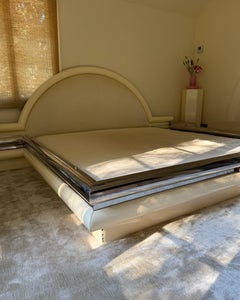 An art deco revival king bed frame with built-in nightstands, Italy circa 1980