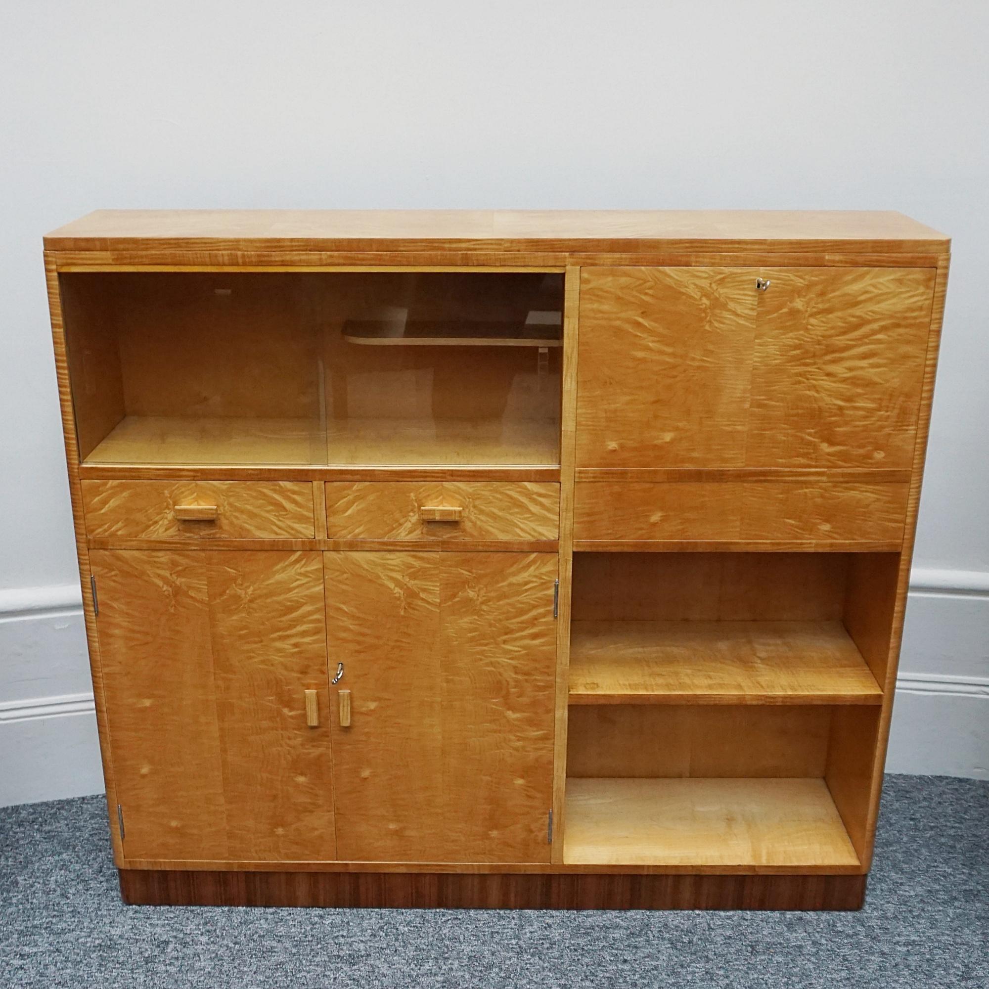 20th Century An Art Deco Satin Birch Honey Coloured Drinks Cabinet by Heal's of London 