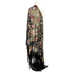 An Art Deco shawl embroidered with flowers on black tulle, circa 1920