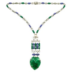 An Art Deco silver metal, green and blue chalcedony glass , clear paste necklace,