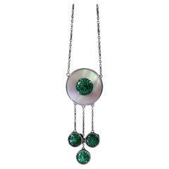 Antique An Art Deco silver mother of pearl green enamel necklace/pendant circa 1920