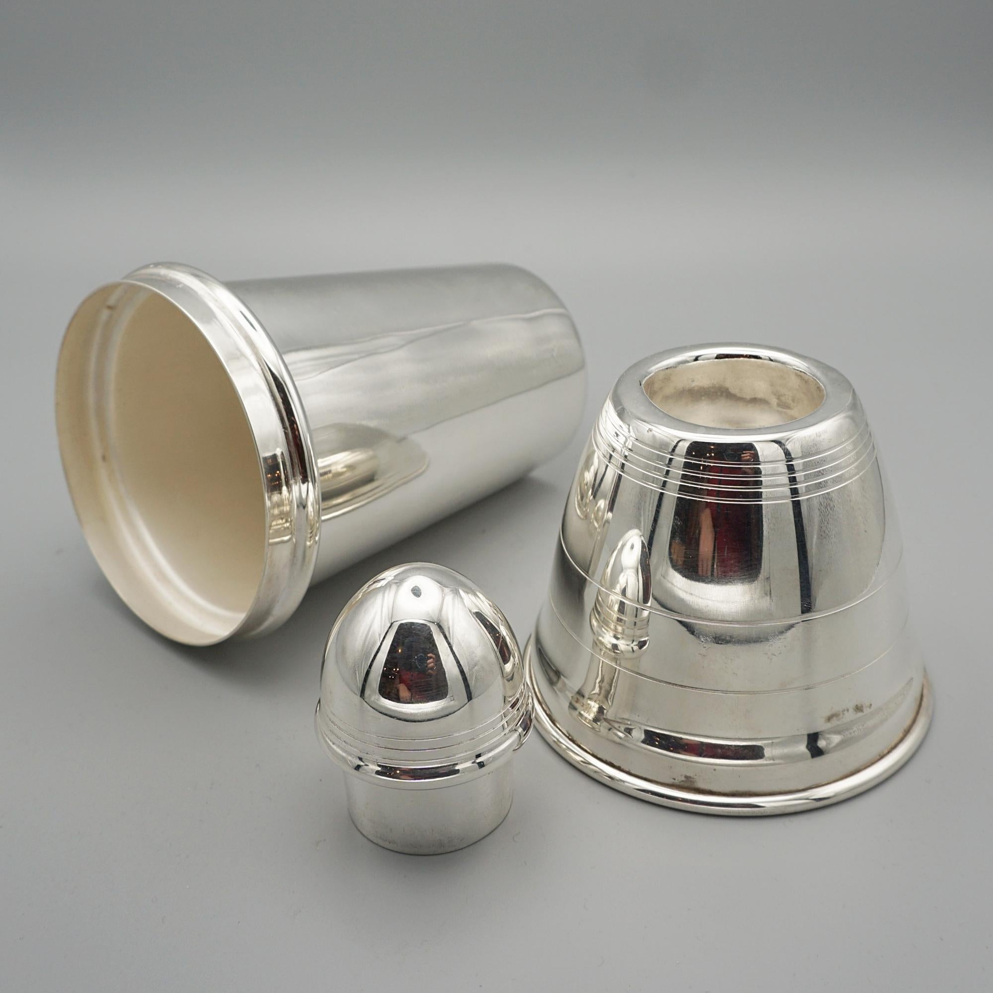 English An Art Deco silver plate bullet cocktail shaker by Yeoman