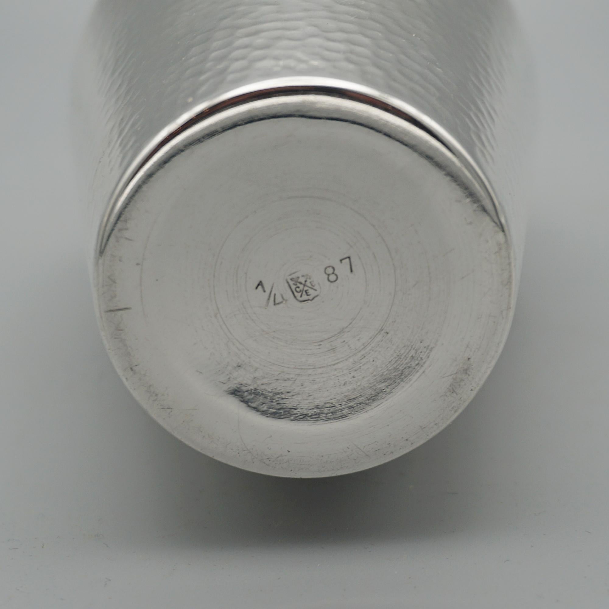 n Art Deco burnished / hammered silver plated cocktail shaker by Carl Deffner of Esslingen silver. In excellent condition, stamped to base.