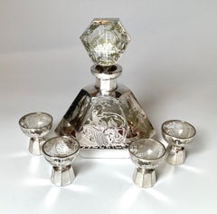 An Art Deco Sterling Silver Overlay Cordial Decanter Set 1920's