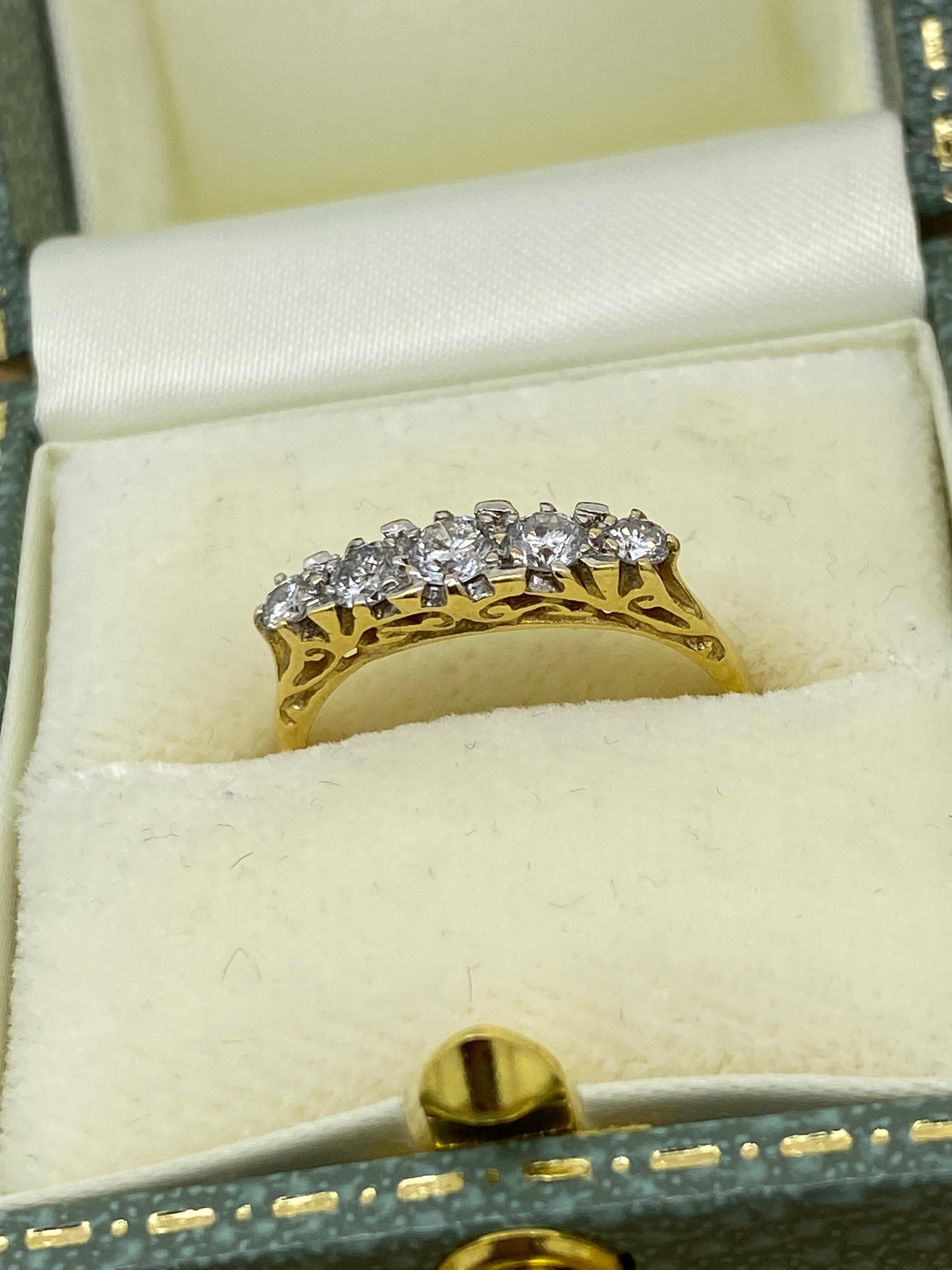 An Art-Deco Style 5-Stone Half-Hoop 0.65ct Diamond Ring. English hallmarks. In Excellent Condition For Sale In MELBOURNE, AU