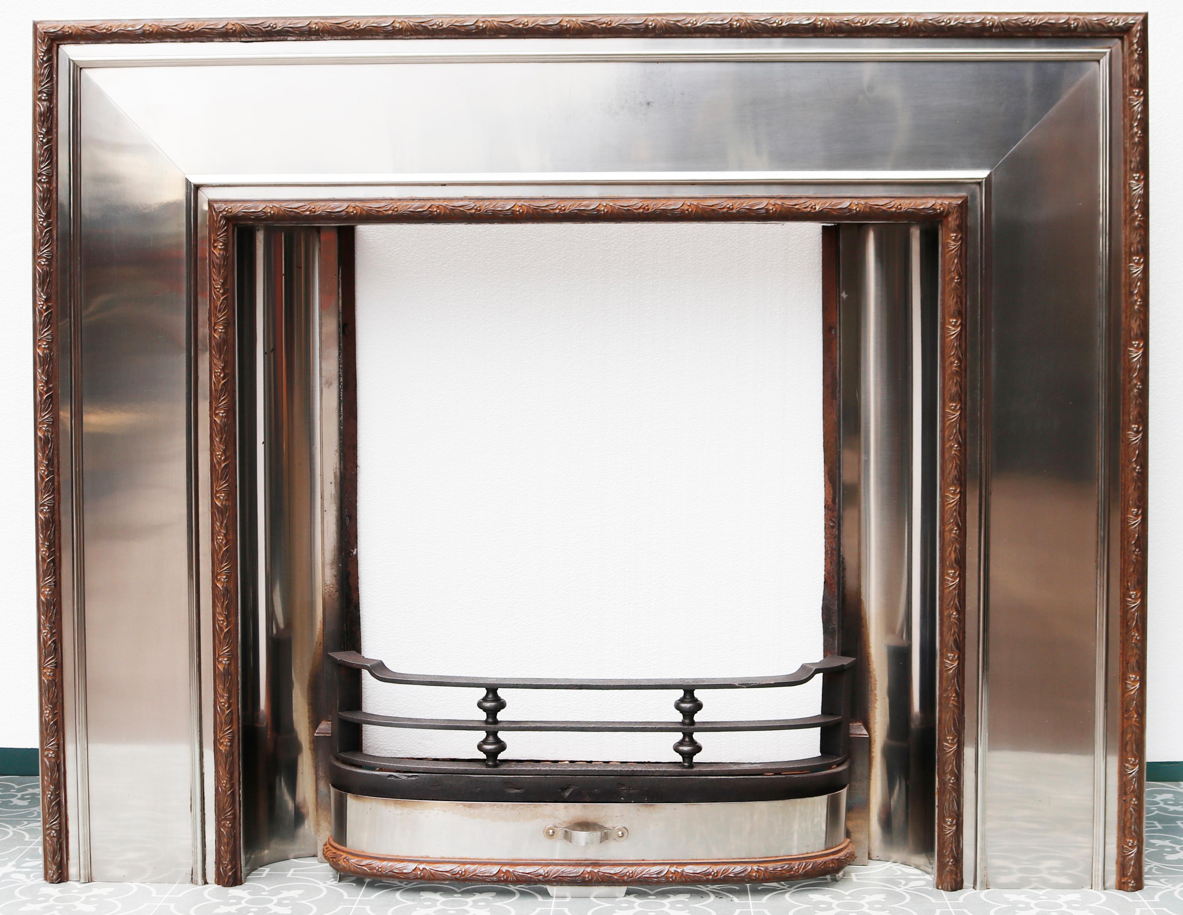 A very attractive ‘Bratt Colbran’ fire surround made from stainless steel in the Art Deco style.

This fireplace can either be used either as an insert, or as a surround.