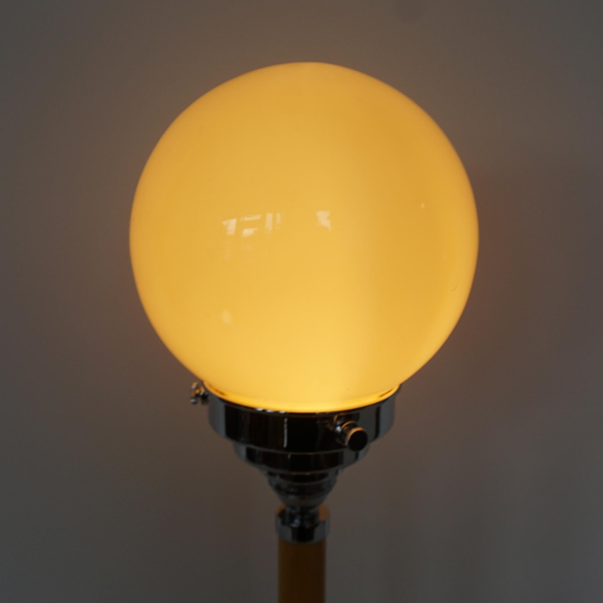 An Art Deco Style Chrome & Bakelite Dome Table Lamp 1